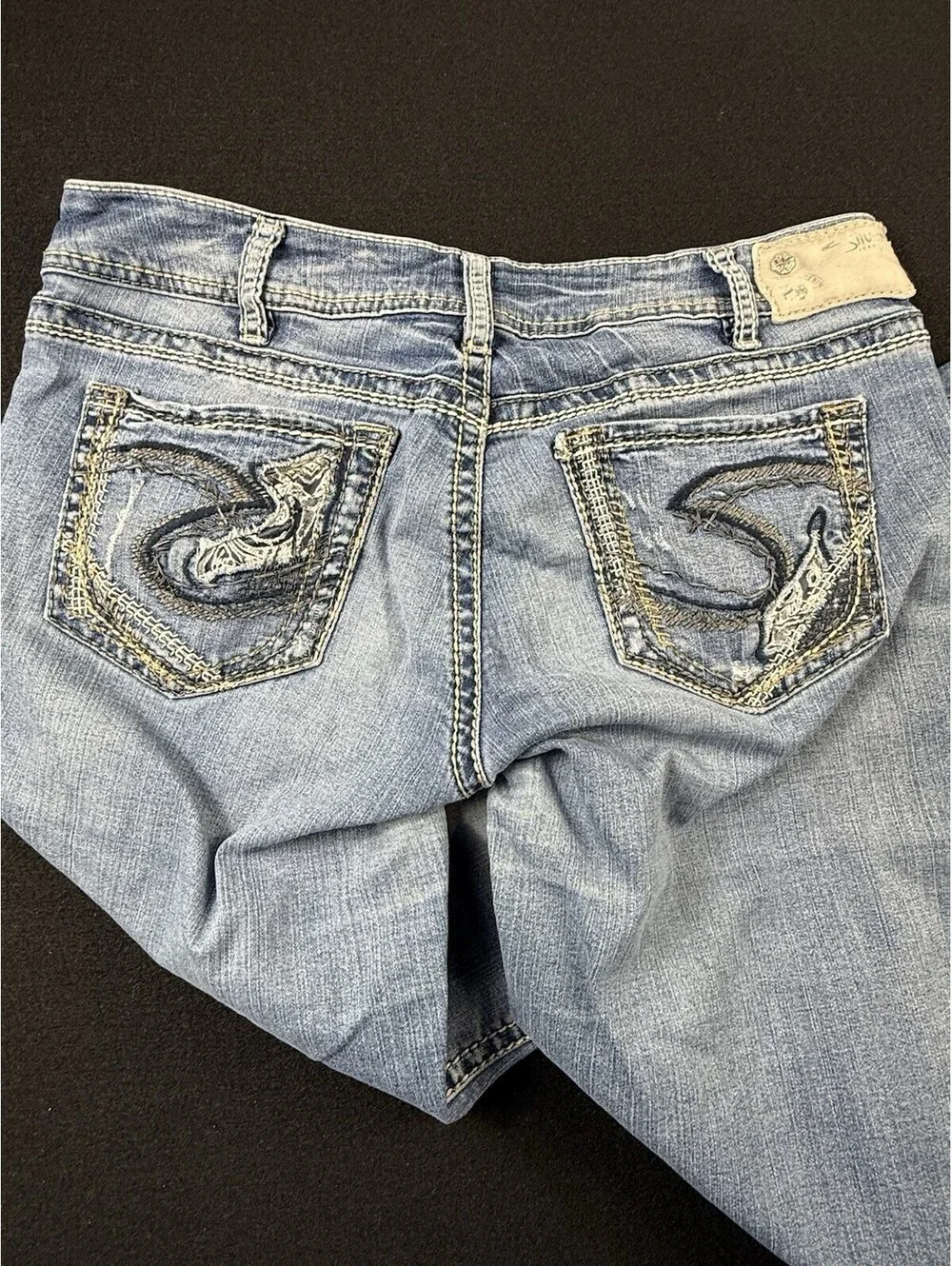 Silver Jeans Co. Men’s Suki Blue Light Wash Slim Bootcut Jeans Distressed